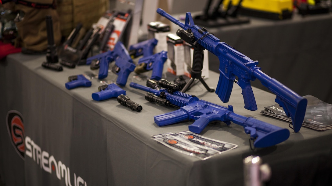 Members of the Defense industries show equipment to Marines from Camp Pendleton during the Marine West Expo, on Marine Corps Base Camp Pendleton, Calif., Feb 1, 2017. The 2017 Marine West Exposition is a forum for defense contractors to display and promote their latest equipment and technology.