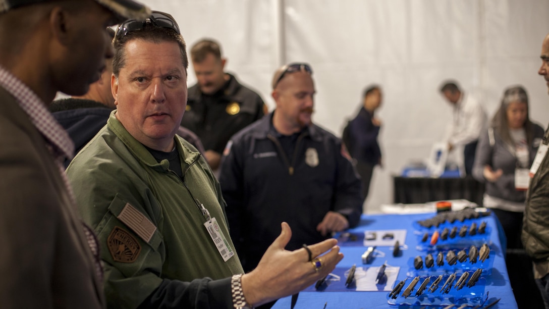Members of the Defense industries show equipment to Marines from Camp Pendleton during the Marine West Expo, on Marine Corps Base Camp Pendleton, Calif., Feb 1, 2017. The 2017 Marine West Exposition is a forum for defense contractors to display and promote their latest equipment and technology.