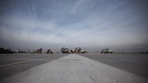 Members of the 455th Expeditionary Civil Engineer Squadron repair a strip of runway Feb. 1 2017 at Bagram Airfield, Afghanistan. The 455th ECES Pavements and Construction; Power Productions; and Structures Shops teamed up to repair a strip of damaged runway. (U.S. Air Force photo by Staff Sgt. Katherine Spessa)