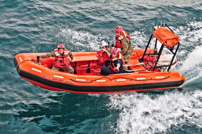 Army Mariners with the 411th Transportation Detachment search for Oscar the training mannequin during a man-overboard drill aboard the Army logistic support vessel Maj. Gen. Charles P. Gross during cargo operations in the Arabian Gulf Jan. 19, 2017. The crew hauled cargo to Qatar from Port of Shuaiba, Kuwait and transported another load during the return trip. While underway the crew practiced several maritime emergency exercises including man overboard, fire, and battle drills. The crew consisted of watercraft operators, engineers, cooks, and medics, although each member is trained to perform several tasks outside the scope of their duty specialty in case of an emergency situation. (U.S. Army photo by Sgt. Aaron Ellerman)