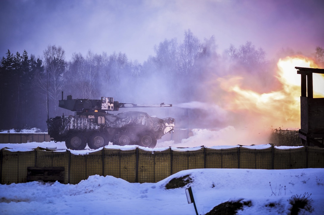 Soldiers fire a mobile gun system during an exercise at the 7th Army Training Command’s Grafenwoehr Training Area, Germany, Jan. 31, 2017. The soldiers are assigned to 2nd Squadron, 2nd Cavalry Regiment. The exercise aims to prepare the squadron for enhanced forward presence in 2017 to execute a variety of tactical missions. Army photo by Pfc. Javon Spence