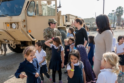 Students and faculty from Emek Hebrew Academy Teichman Family Torah Center in Sherman Oaks, California, speak to a Soldier from the 270th Military Police Company, 49th Military Police Brigade, California Army National Guard, prior to start of Vigilant Guard 17 at the Federal Emergency Management Agency (FEMA) California Task Force 1, Los Angeles. “One of the cooler things was, some of the females came up to me asking, ‘Well why can’t we be in the Army?’ Well guess what? I actually have some female Soldiers here who have been successful, who have deployed,” explained 1st Lt. Brian Frizzle, 270th executive officer. 