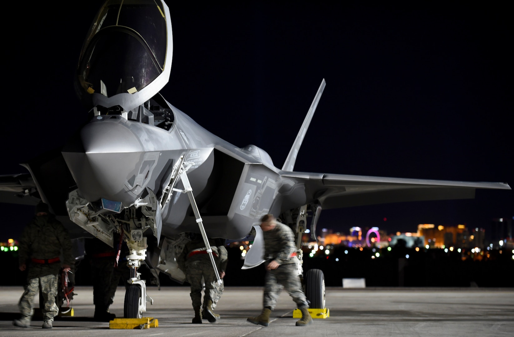 Maintainers from the 419th and 388th Fighter Wings conduct conducts preflight checks on an F-35A Lightning II from Hill Air Force Base, Utah, during Red Flag 17-1 at Nellis Air Force Base, Nev., Jan. 24, 2017. Airmen from the active duty 388th FW and Air Force Reserve 419th FW fly and maintain the Lightning II in a total force partnership, capitalizing on the strength of both components. (U.S. Air Force photo by Staff Sgt. Natasha Stannard)