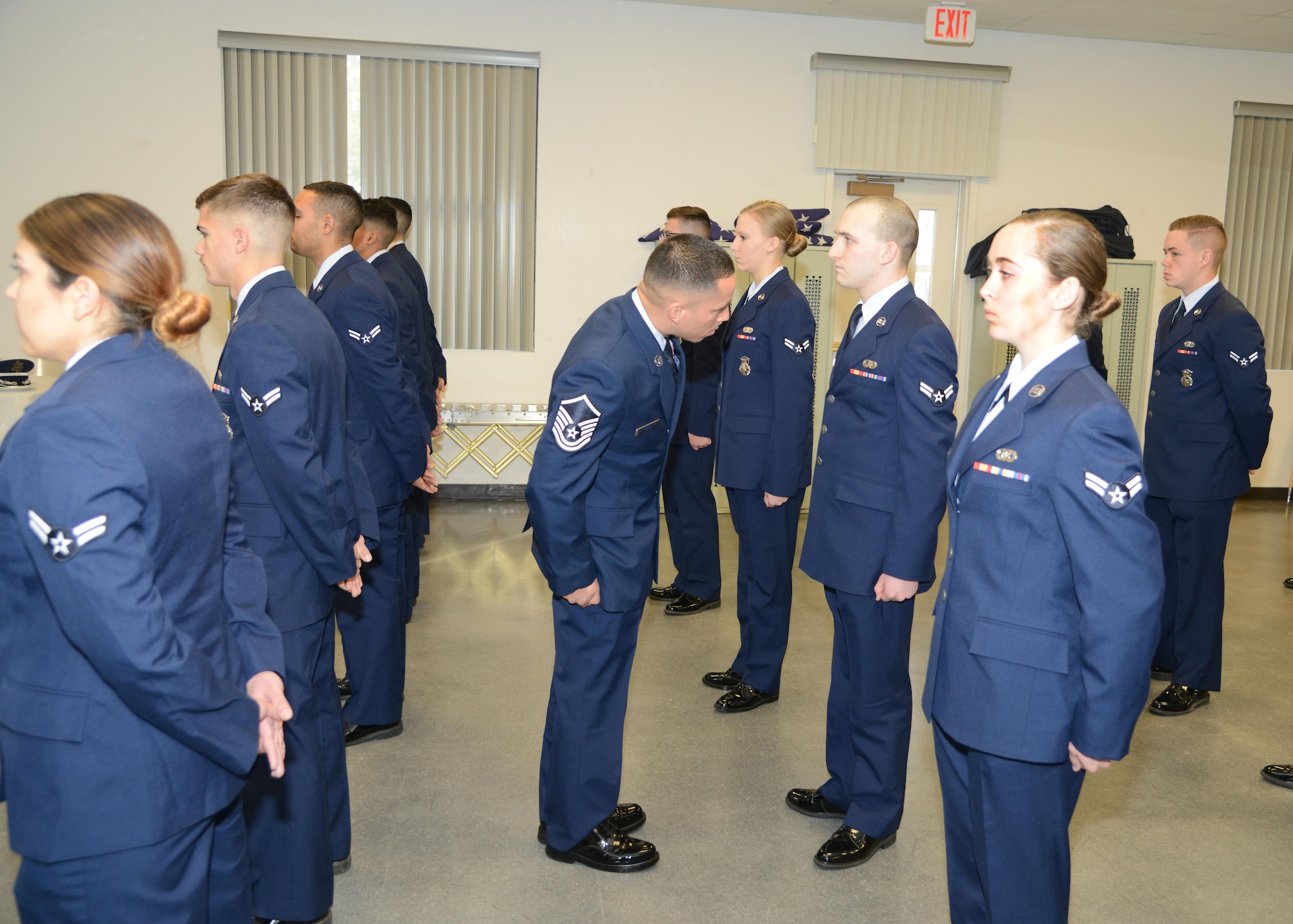 Master Sgt. Ryan Rios, 412th Operations Support Squadron, performs an open ranks inspection of Edwards First Term Airman's Center class 17A. Rios is a former military training instructor. (U.S. Air Force Photo by Christopher Ball)
