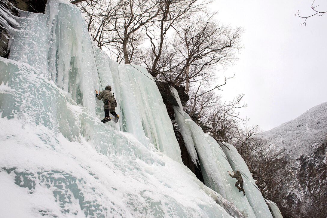 Army National Guard members climb an ice-covered cliff at Smugglers' Notch in Jeffersonville, Vt., Jan. 28, 2017. Air National Guard photo by Tech. Sgt. Sarah Mattison