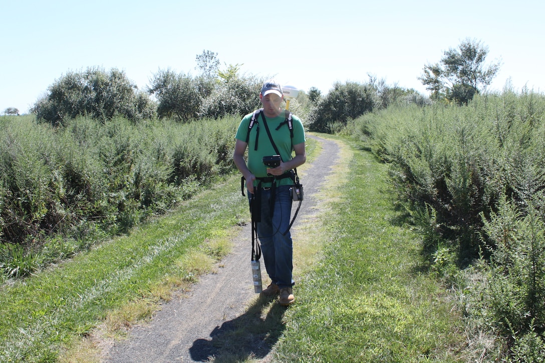Neil Miller conducts a gamma walkover survey at Great Skills State Park, Staten Island, New York. 