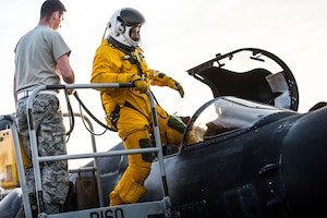 U-2 pilot Maj. Ryan enters into a cockpit before flying a sortie in support of Combined Joint Task Force-Operation Inherent Resolve at an undisclosed location in Southwest Asia, Feb. 2, 2017. During the sortie, the aircraft completed 30,000 hours of flight. This marked the second U-2 in the USAF fleet to reach the milestone and the first overall while flying expeditionary missions under Air Force Central Command. (U.S. Air Force photo/Senior Airman Tyler Woodward)