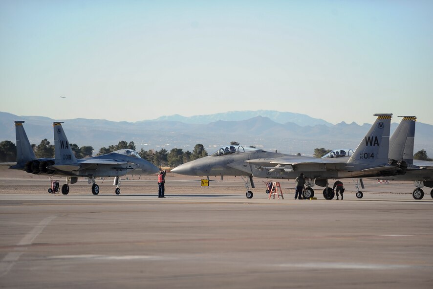 Aircraft 83-3014, an F-15 Eagle, sits on the flightline after reaching 10,000 flight hours during a sortie at Nellis Air Force Base, Nev., Jan. 25, 2017. The aircraft is the first F-15 assigned to a Nellis AFB unit to hit the 10,000 hour milestone. (U.S. Air Force photo by Staff Sgt. Siuta B. Ika)