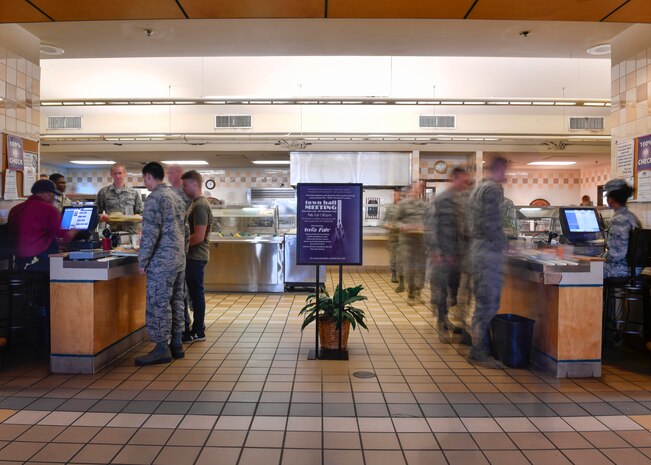Members of Team Charleston scan their Common Access Cards while checking out at the Robert D. Gaylor Dining Facility here, Feb. 2, 2017. Airmen living in the dorms use meal cards in lieu of using money. The dining facility will close for repairs March 1. Airmen on meal cards will receive a basic allowance for subsistence during the 10-month project.
