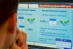 Air Force Maj. Michael Odle, Defense Department assistant director of military compensation policy, reviews the DoD course content for the Blended Retirement System opt-in training at the Pentagon, Jan. 30, 2017. Eligible service members are required to take the opt-in course to learn about their options with the new retirement system, which goes into effect at the start of 2018. 