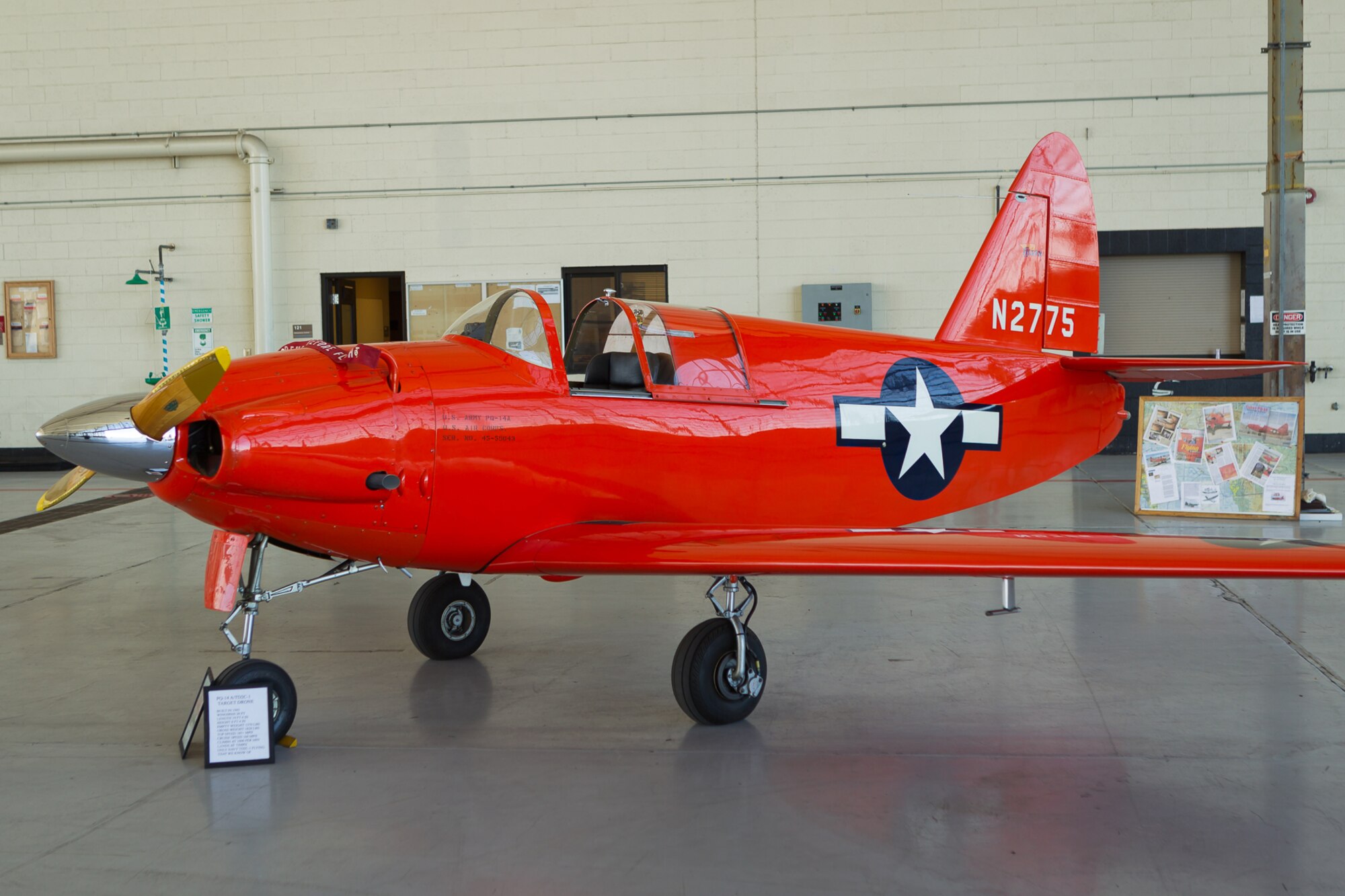 A Culver PQ-14A “Cadet,” serial number 45-59043, wearing a bright red aerial target paint scheme and still in flyable condition shown on static display at an event in California in 2001. (Photo courtesy of Jay Beckman/Crosswind Images)