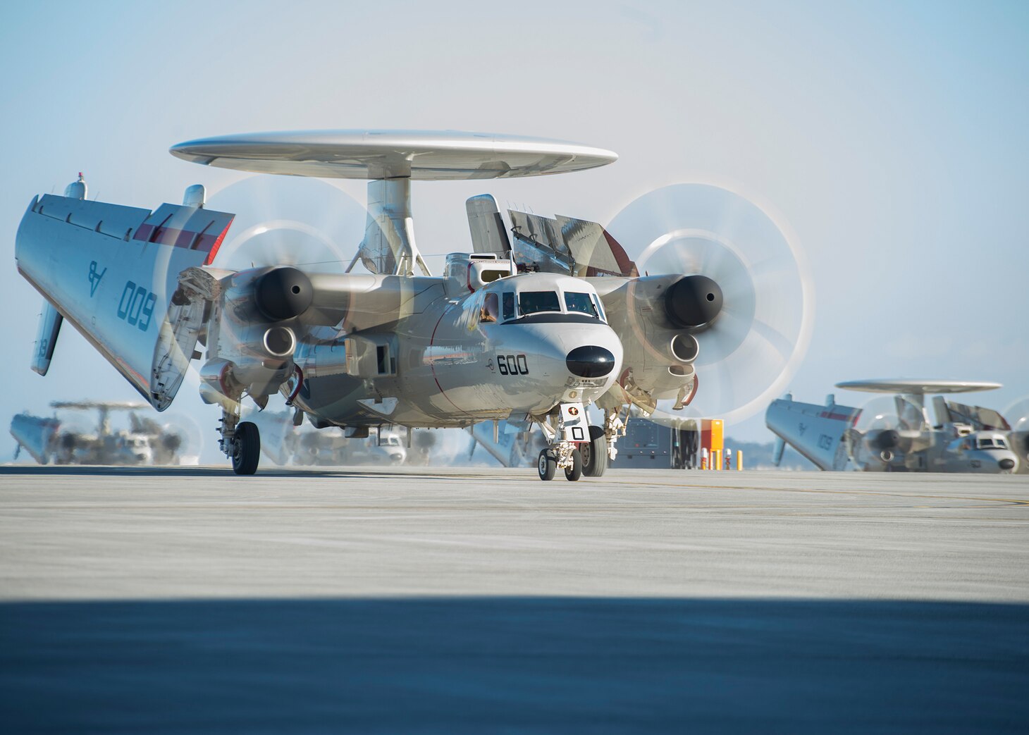 Five E2-D Advanced Hawkeye aircrafts, assigned to the Tigertails of Carrier Airborne Early Warning Squadron (VAW) 125, taxi the runway after arriving onboard Marine Corps Air Station Iwakuni, Feb. 2, 2017. VAW-125 will relieve VAW-115 as the airborne early warning squadron for Carrier Air Wing (CVW) 5 in support of the USS Ronald Reagan (CVN 76) Carrier Strike Group.