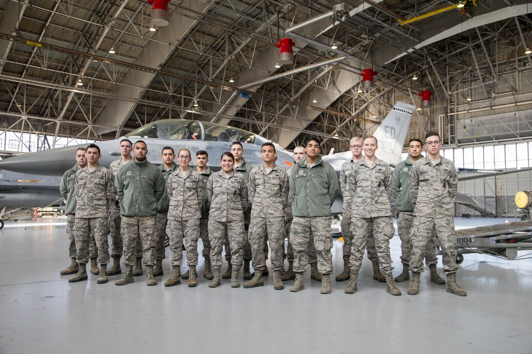 Edwards First Term Airman's Center class 17A visited the 416th Flight Test Squadron and posed for a photo next to an F-16 Fighting Falcon Jan. 27. (U.S. Air Force photo by Chris Higgins)
