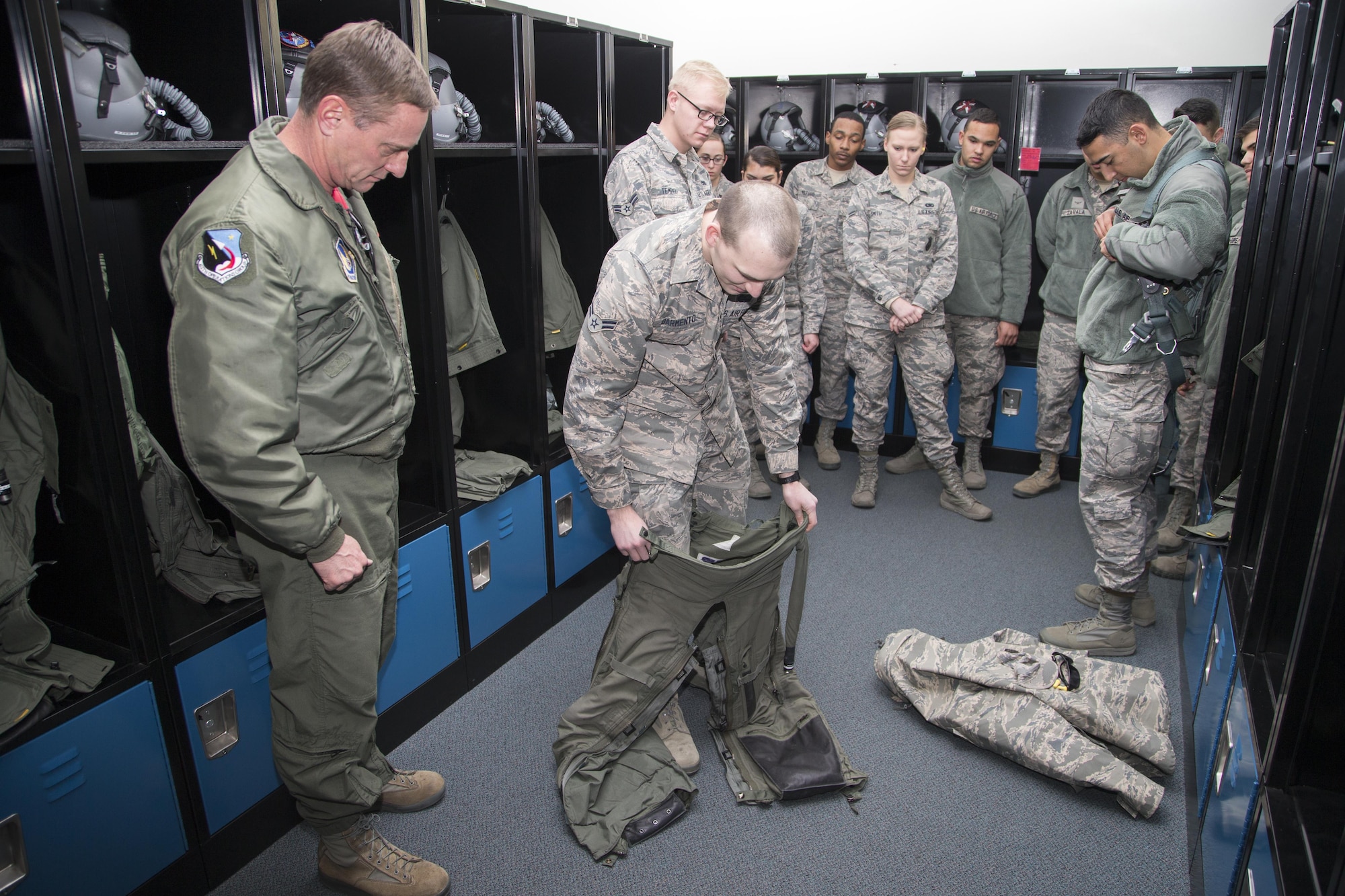 Edwards First Term Airman's Center class 17A visited the 416th Flight Test Squadron Jan. 27 and had the opportunity to try on flight gear. The 412th Test Wing has incorporated the mission of ‘Test’ into its First Term Airmen Center program. Airmen receive a 5-hour immersion into various missions on Edwards. (U.S. Air Force photo by Chris Higgins)