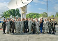 A group of U.S. and Philippine Air Force service members pose for a group photo after concluding a two-week Subject Matter Expert Exchange, Clark Air Base, Philippines, Jan. 25, 2017. Throughout the SMEE military members from both nations trained together using satellite imagery provided by Eagle Vision to enhance their combined readiness when conducting Humanitarian Assistance and Disaster Relief operations common in the Asia-Pacific. (U.S. Air Force photo by Tech. Sgt. James Stewart/Released)