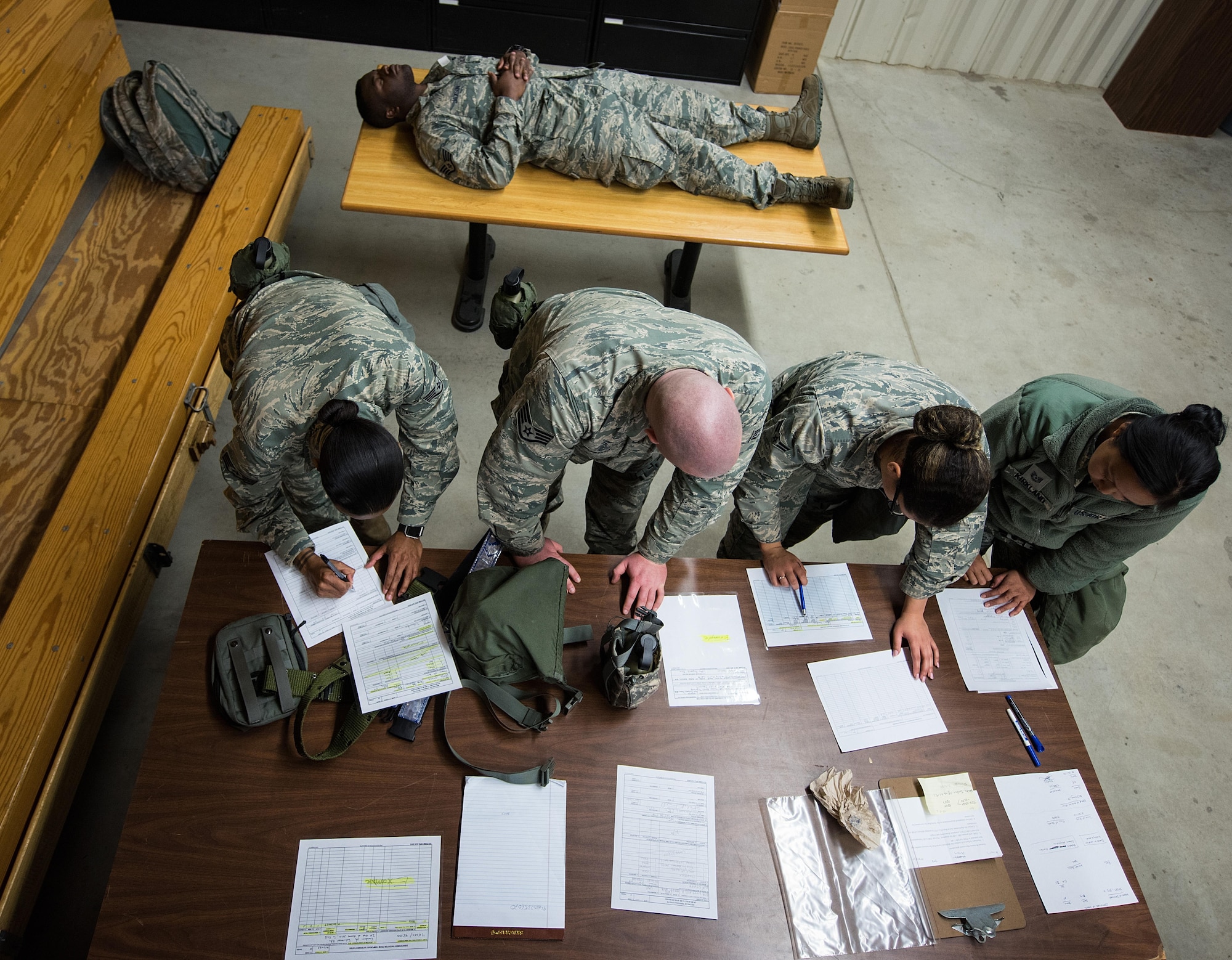 4th Force Support Squadron Airmen simulate mortuary affairs procedures during exercise Coronet Warrior 17-01, Jan. 31, 2017, at Seymour Johnson Air Force Base, North Carolina. The expeditionary exercise tested the 4th Fighter Wing’s abilities to operate in overseas hostile locations. (U.S. Air Force photo by Airman Shawna L. Keyes)