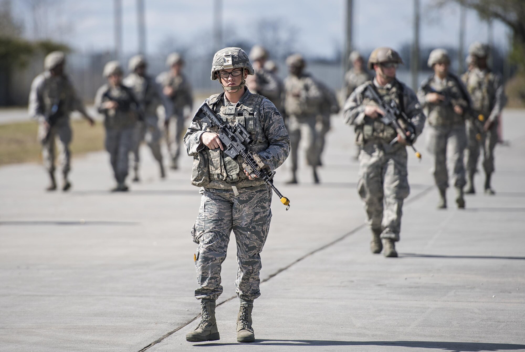 Airman 1st Class Danielle Brannon, 822d Base Defense Squadron fire team member, walks on patrol during contact training, Feb. 1, 2017, at Moody Air Force Base, Ga. The Airmen were practicing movements and procedures they would employ if engaged by hostile forces while out on patrol. The 13-Airman patrol is broken into three four-person teams, with one leader who directs the leaders of all four teams. (U.S. Air Force photo by Airman 1st Class Janiqua P. Robinson)