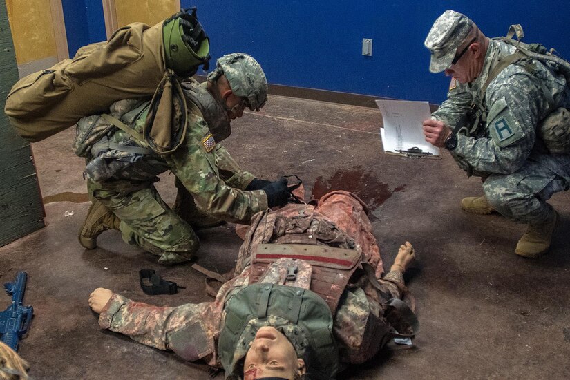 Army Reserve Sgt. First Class Fernando Terrazas, assigned to 2/364 Training Support Battalion, 5th Armored Brigade, applies a tourniquet on a casualty to stop the bleeding at the Medical Simulation Training Center during the First Army Division West Best Warrior Competition at Fort Bliss, Texas, Jan. 19, 2017. The winner of the First Army level Best Warrior Competition will have a chance to compete in the U.S. Army’s Best Warrior Competition at Fort A.P. Hill, Virginia for the opportunity to be the Army's Best NCO and Soldier of the Year.
(U.S. Army photo by Sgt. Matthew S. Griffith/Released)