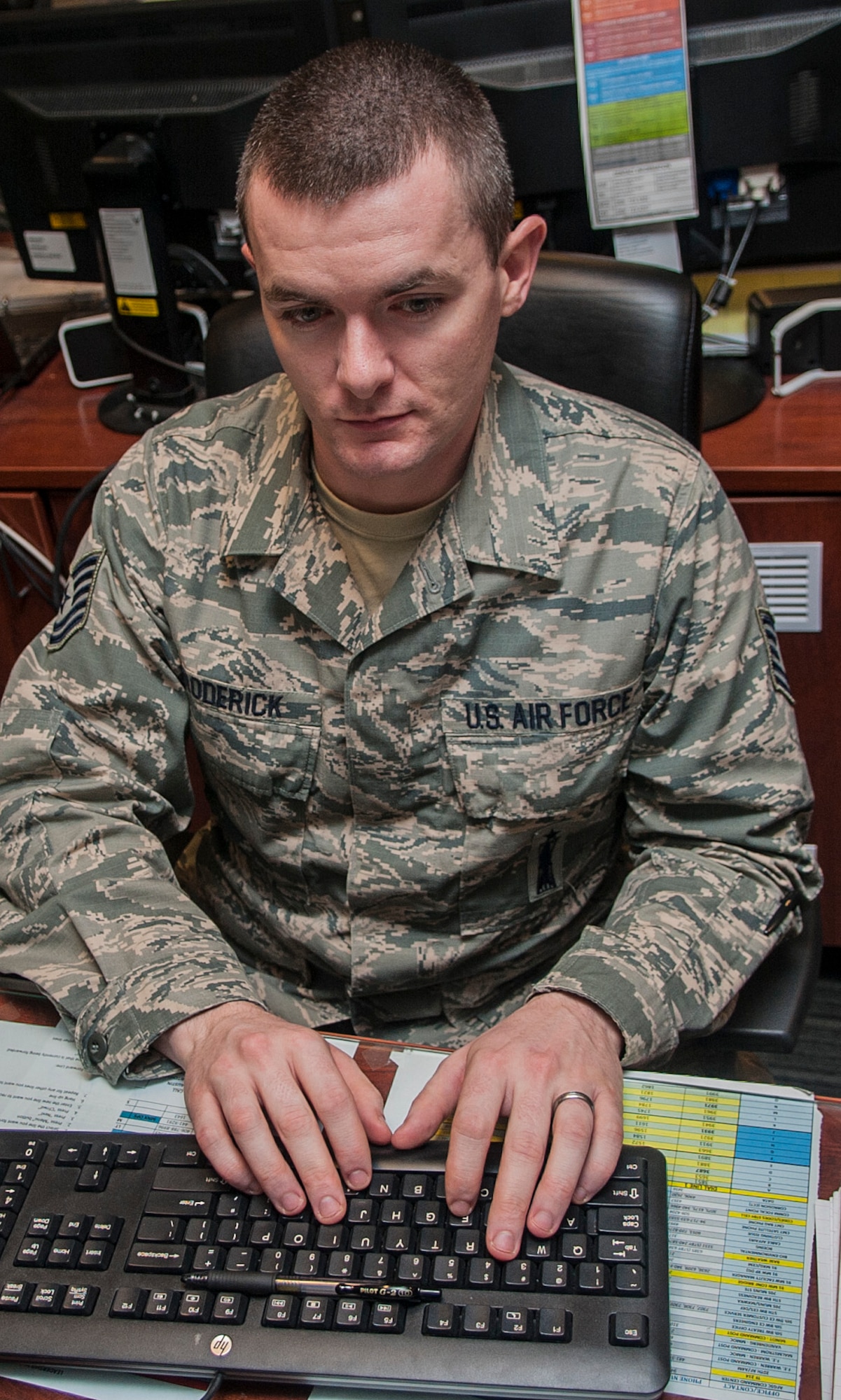 Tech Sgt. James Broderick, 791st Maintenance Squadron Missile Maintenance Operations Center controller, updates the integrated maintenance data system at Minot Air Force Base, N.D., Jan. 24, 2017. Airmen in the MMOC are responsible for assessing the operations of maintenance teams that are at missile sites in the field. (U.S. Air Force photo/Airman 1st Class Jonathan McElderry)