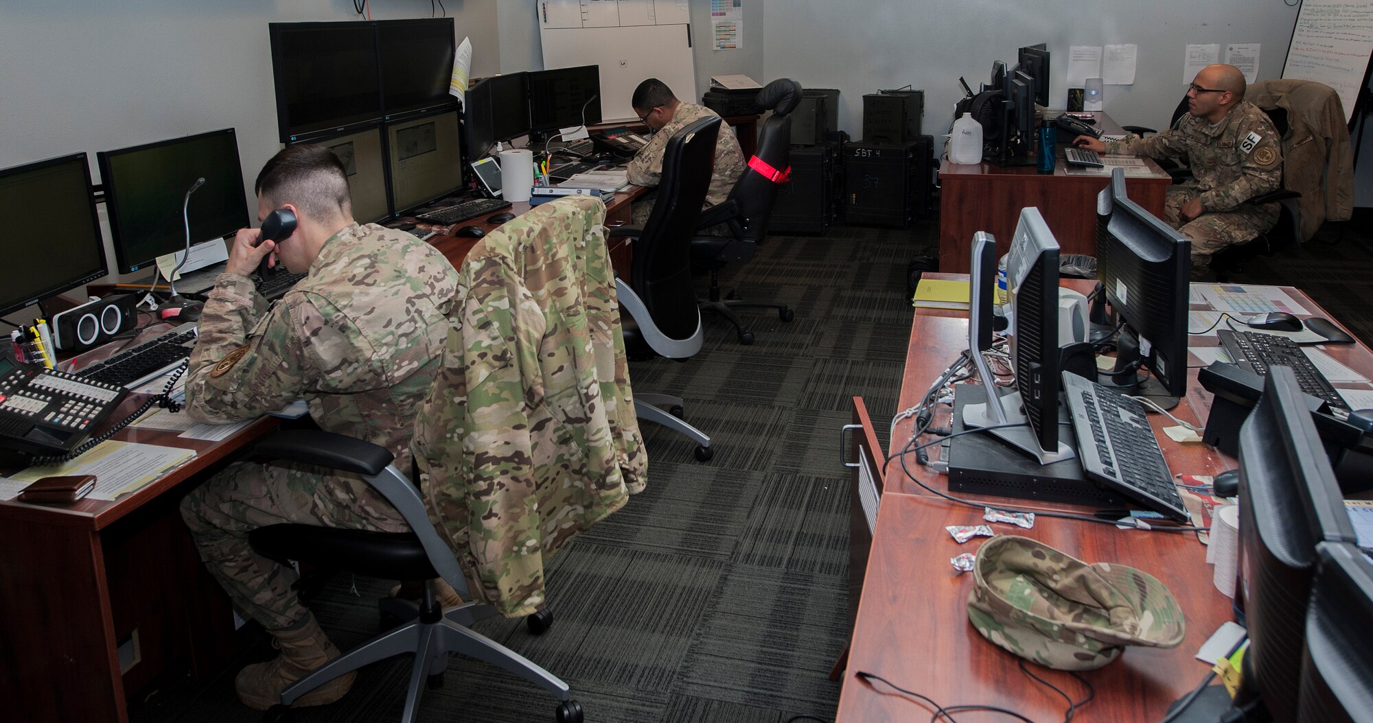 Airmen in the 91st Missile Maintenance Operations Center manage maintenance operations at Minot Air Force Base, N.D., Jan. 24, 2017. Airmen with the MMOC are responsible for annotating what maintenance teams are doing at the missile sites in the field. (U.S. Air Force photo/Airman 1st Class Jonathan McElderry)