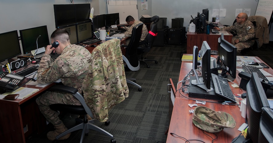 Airmen in the 91st Missile Maintenance Operations Center manage maintenance operations at Minot Air Force Base, N.D., Jan. 24, 2017. Airmen with the MMOC are responsible for annotating what maintenance teams are doing at the missile sites in the field. (U.S. Air Force photo/Airman 1st Class Jonathan McElderry)