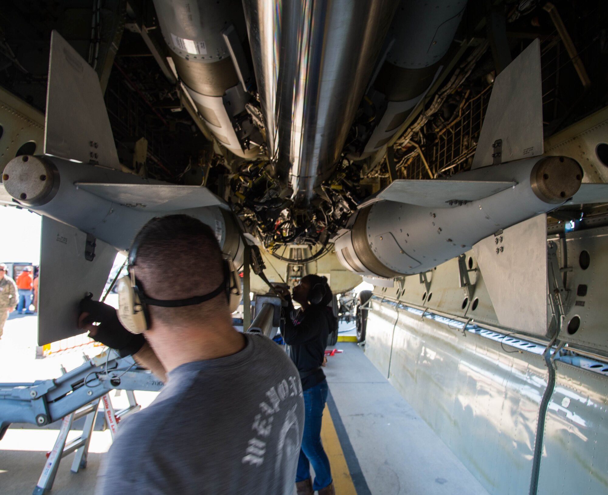 Airmen from the 307th Aircraft Maintenance Squadron ready secure munitions to a Conventional Rotary Launcher at Barksdale Air Force Base, La., Feb. 1, 2017. The CRL allows the B-52 Stratofortress to carry multiple types of munitions to be carried on a single mission. The bombs were part of the first live-fire test of the CRL’s capabilities. (U.S. Air Force photo by Staff Sgt. Jason McCasland/ Released)