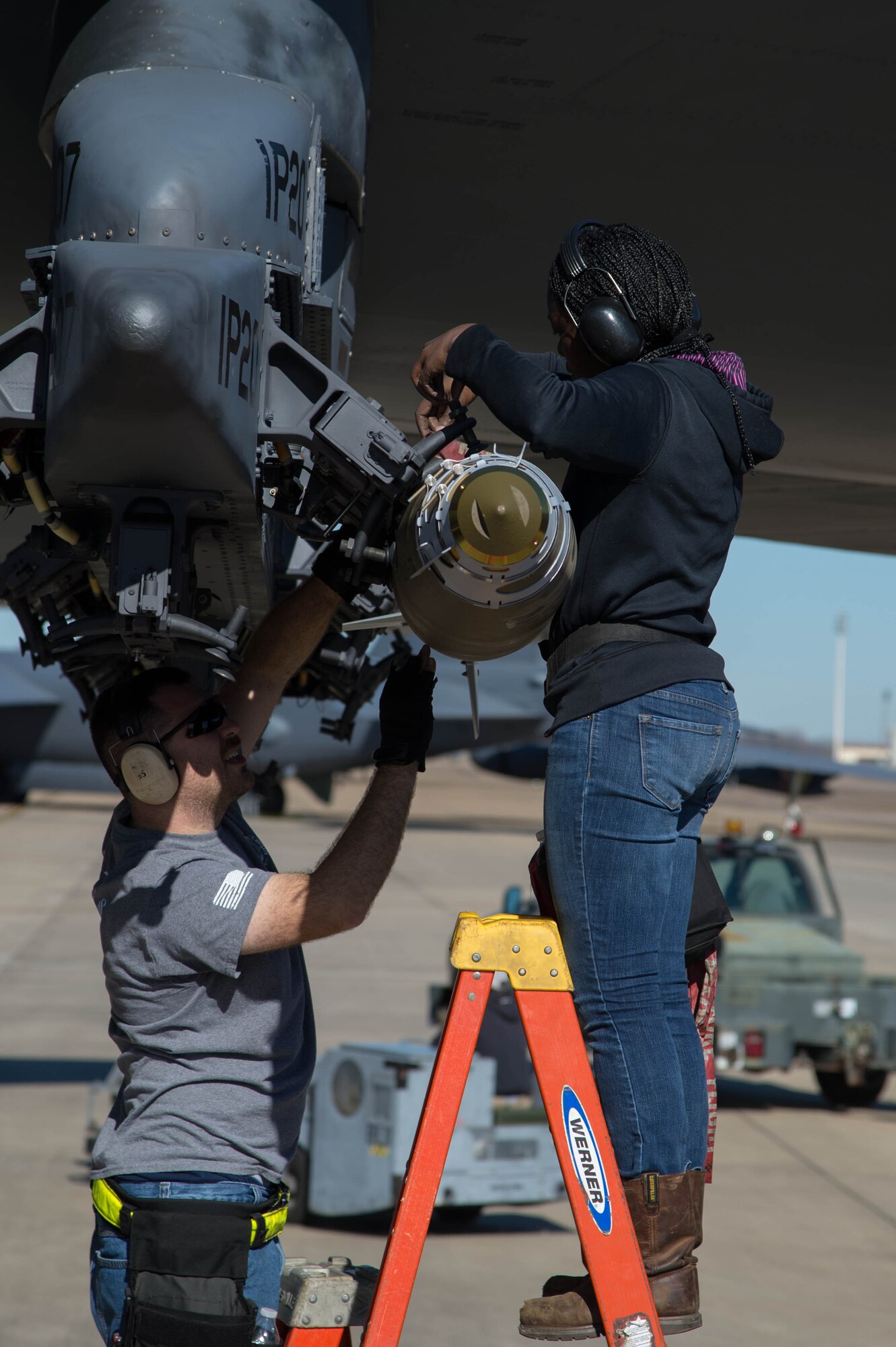 Airmen from the 307th Aircraft Maintenance Squadron load a 500 pound Joint Direct Attack Munitions under the wing of a B-52 Stratofortress at Barksdale Air Force Base, La., Feb. 1, 2017. Earlier, the Airmen put munitions on a Conventional Rotary Launcher, a new weapons system allowing the B-52 to carry up to eight different types of bombs on a single mission. The CRL was being tested for the first time in a live fire training mission (U.S. Air Force photo by Staff Sgt. Jason McCasland/Released)