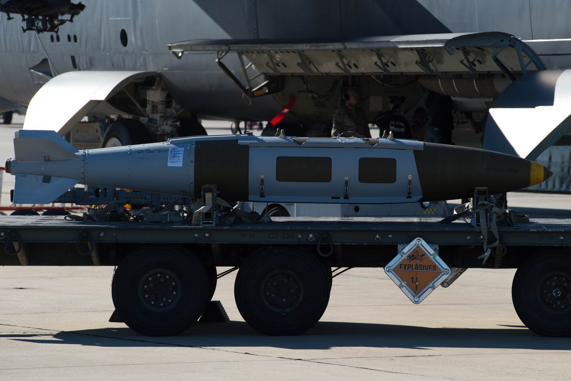 A 2000 pound Joint Direct Attack Munition awaits loading onto a Conventional Rotary Launcher at Barksdale Air Force Base, La., Feb. 1, 2017. The CRL is a new weapons system for the B-52 Stratofortress, giving the jet greater flexibility in applying different munitions to different targets. (U.S. Air Force photo by Staff Sgt. Jason McCasland/Released)