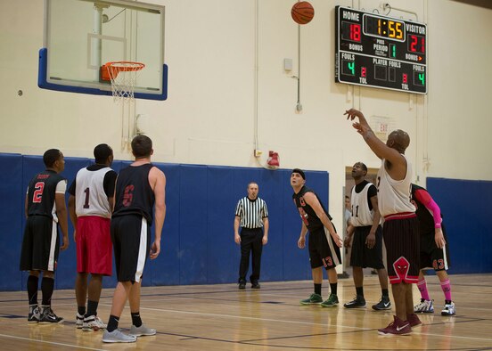 David Carter, Maintenance Group power forward, shoots a free throw during the first half of the Intramural Basketball Championship game, Jan. 30, at Mountain Home Air Force Base, Idaho. MXG beat the Civil Engineer 51-42. Carter was his team's second leading scorer with 13 points.