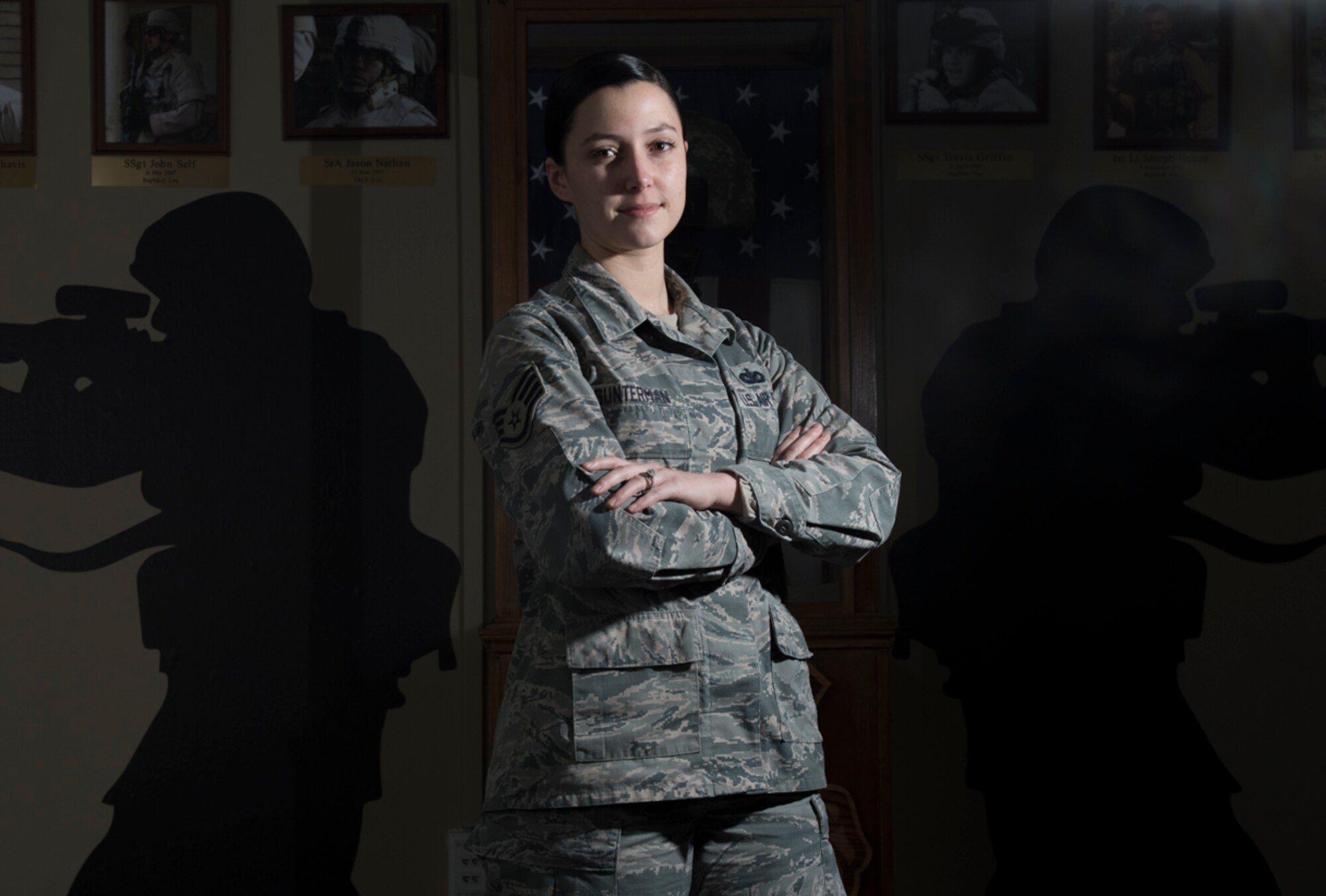 Staff Sgt. Kiirsten Gunterman, 374th Security Forces Squadron training instructor, poses for a photo at Yokota Air Base, Japan, Jan. 20, 2017. Gunterman spent 17 years practicing ballet before joining the Air Force, where she has seen the world, met many people and performed duties from guarding nuclear weapons to instructing Combatives classes. (U.S. Air Force photo by Senior Airman Elizabeth Baker)
