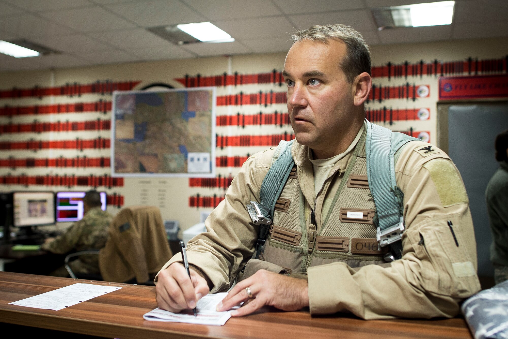 U. S. Air Force Col. David Brynteson, 332nd Expeditionary Operations Group commander, prepares for his fini flight Jan. 27, 2016, in Southwest Asia. Brynteson has been commanding here for four months leading combat operations in the area of responsibility. (U.S. Air Force photo by Staff Sgt. Eboni Reams)