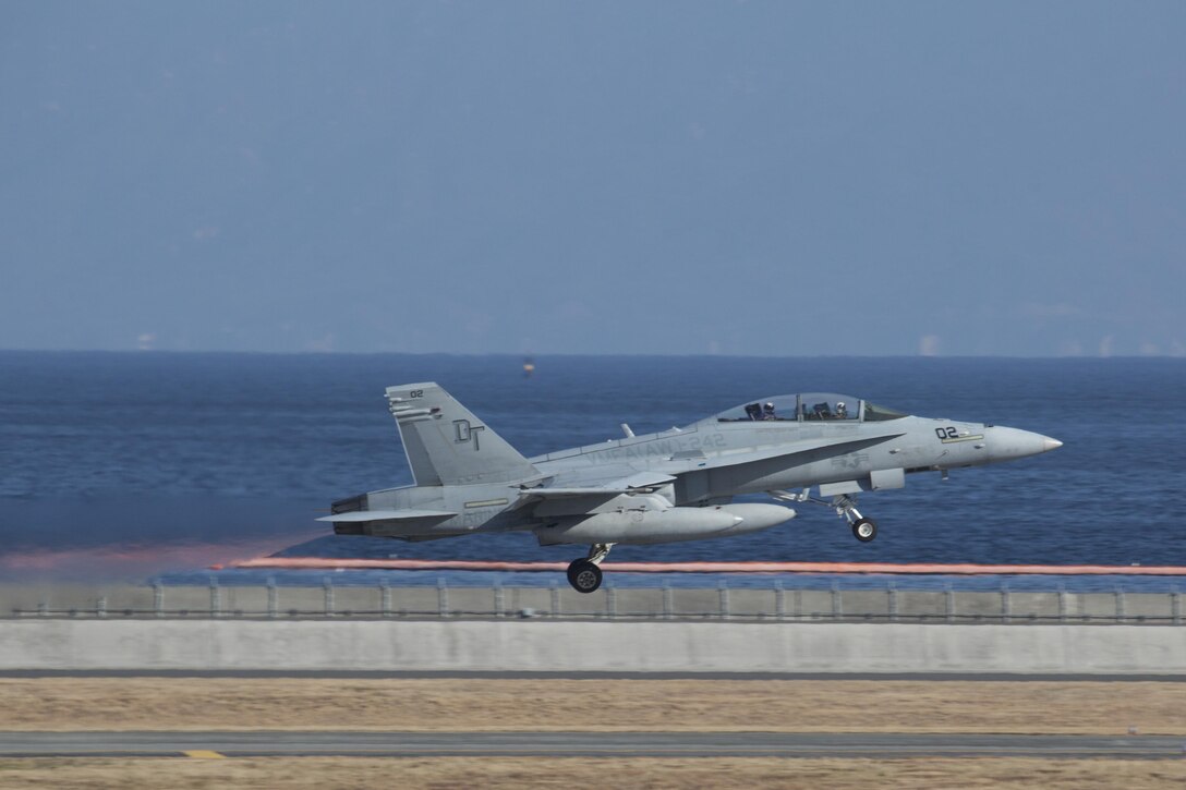 A U.S. Marine Corps F/A-18D Hornet with Marine All-Weather Fighter Attack Squadron (VMFA) 242, departs the runway at Marine Corps Air Station Iwakuni, Japan, Feb. 3, 2017. VMFA(AW)-242’s mission is to support the Marine Air-Ground Task Force commander by providing supporting arms coordination, conducting reconnaissance, and destroying surface targets and enemy aircraft day or night. They train under all weather conditions for expeditionary, joint or combined operations. (U.S. Marine Corps photo by Lance Cpl. Joseph Abrego)