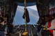 Spouses enjoy the view out of the open cargo doors of a C-130H Hercules during a Spouse Orientation Flight Feb. 1, 2017, at Yokota Air Base, Japan. The event is the last scheduled C-130H Spouse Orientation Flight before the aircraft are retired from active duty. (U.S. Air Force photo by Airman 1st Class Donald Hudson)