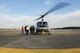 Participants of a Spouse Orientation Flight board a UH-1N Iroquois Feb. 1, 2017, at Yokota Air Base, Japan. Participants who flew in a UH-1N were given an aerial tour of down town Tokyo. (U.S. Air Force photo by Airman 1st Class Donald Hudson)