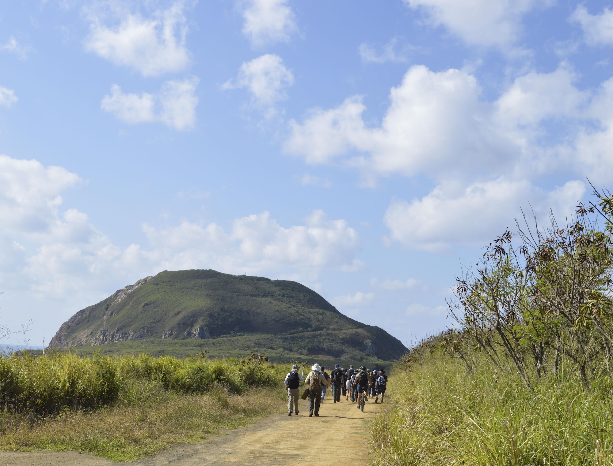 U.S. Air Force Airmen from Kadena Air Base, Japan, walk along a trail to Mount Suribachi, Iwo Jima, Jan. 12, 2017. Airmen from different units throughout Kadena were selected for this special trip as part of a professional military education outing to learn about the battle of Iwo Jima. (U.S. Air Force photo by Senior Airman Lynette M. Rolen/Released)