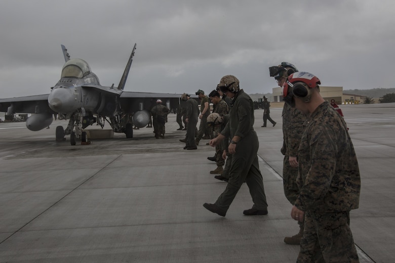 U.S. Marines with Marine All Weather Fighter Attack Squadron (VMFA) 225 conduct a foreign object debris walk prior to the take of several F/A-18D Hornets during exercise Cope North at Andersen Air Force Base, Guam, Feb. 3, 2017. Any stray item left on the runway could have negative consequences on an aircraft preparing to depart. Marines trained with the Royal Australian Air Force and Japan Air Self-Defense Force supporting theater security, focusing on dissimilar air combat training and large force employment. (U.S. Marine Corps photo by Cpl. Nathan Wicks)