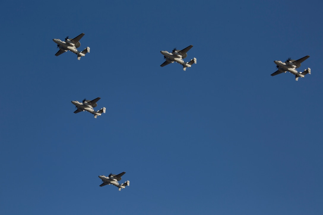 Five U.S. Navy E-2D Advanced Hawkeyes with Carrier Airborne Early Warning Squadron fly in a “V” formation prior to landing at Marine Corps Air Station Iwakuni, Japan, Feb. 2, 2017. VAW-125 arrived at MCAS Iwakuni, from Naval Station Norfolk, Va. The E-2D Advanced Hawkeye is equipped with the most advanced airborne radar in the world, possessing systems which increase the capabilities to defend Japan and provide security in the Indo-Asia-Pacific region. (U.S. Marine Corps photo by Lance Cpl. Gabriela Garcia-Herrera)