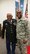 Air Force Reserve Rescue Warrior Maj. Marcus Smith poses with Army Sergeant First Class Melvin Morris who was presented the Congressional Medal of Honor by President Obama in 2014, 45 years after his actions during Vietnam serving as a green beret. Upon meeting Smith, Morris presented him with one of his congressional MOH Society coins without any explanation as to why. Smith said he was moved by the gift and Morriss' inspirational stories