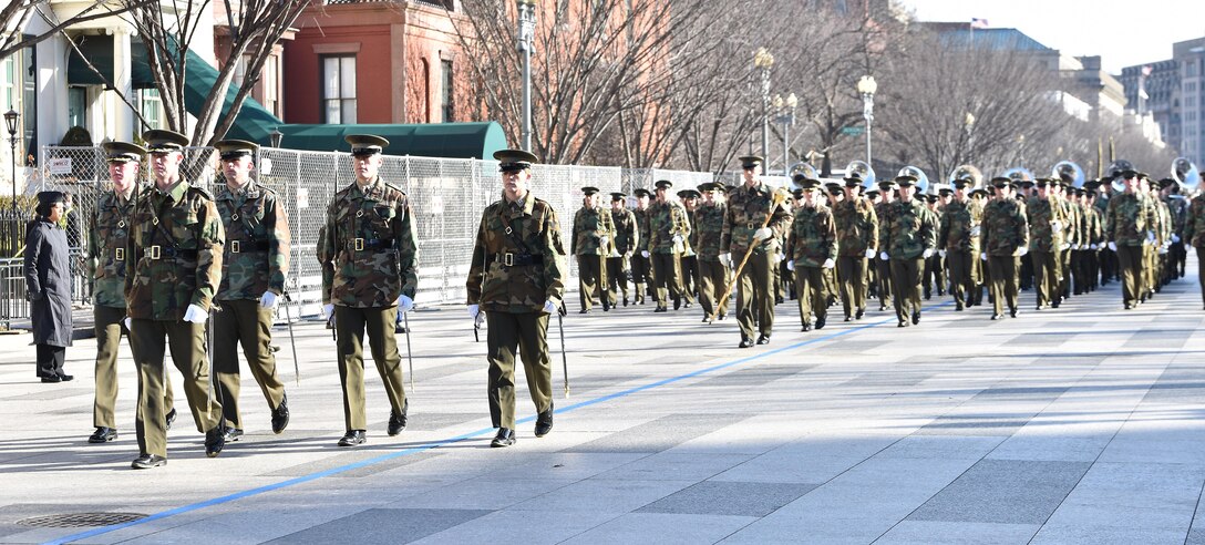 The United States Marine Corps, Staff Element, marches down Pennsylvania Avenue followed by the Marine Corps Field Band, during a Department of Defense dress rehearsal in Washington, D.C., Jan. 15, 2017. More than 5,000 military members from all branches of the armed forces of the United States, including Reserve and National Guard components, provided ceremonial support and Defense Support of Civil Authorities during the inaugural period. (DoD photo by U.S. Air Force Senior Airman Stefan Alvarez)