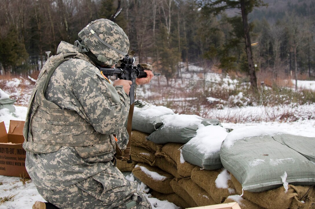 Army National Guard Spc. Emelio Madera-Valerio provides cover fire for mortar crews during a live-fire exercise at Camp Ethan Allen Training Site, Jericho, Vt., Jan. 26, 2017. Madera-Valerio is assigned to the Vermont Army National Guard’s Company A, 3rd Battalion, 172nd Infantry Regiment, 86th Infantry Brigade Combat Team (Mountain). Army National Guard photo by Spc. Avery Cunningham