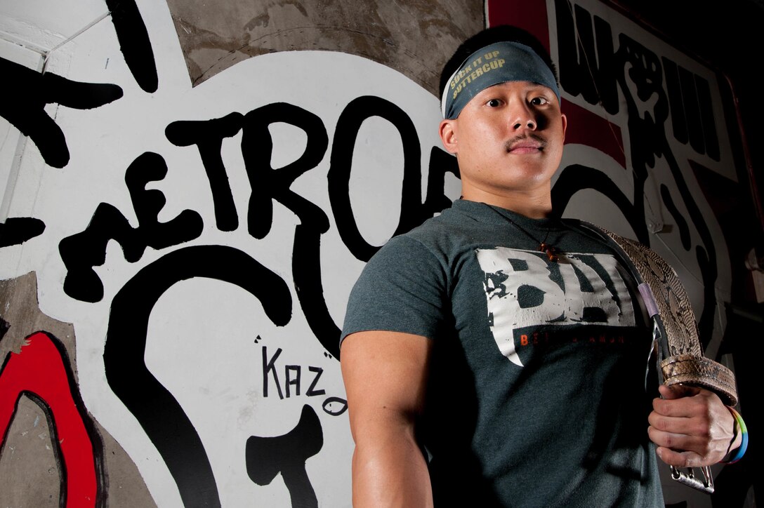 Air Force Senior Airman Benjamin Le, a services apprentice with the Texas Air National Guard’s 136th Force Support Squadron, poses for a photo at Metroflex Gym-Plano in Plano, Texas Jan. 4, 2017. Texas Air National Guard photo by Senior Airman De'Jon Williams