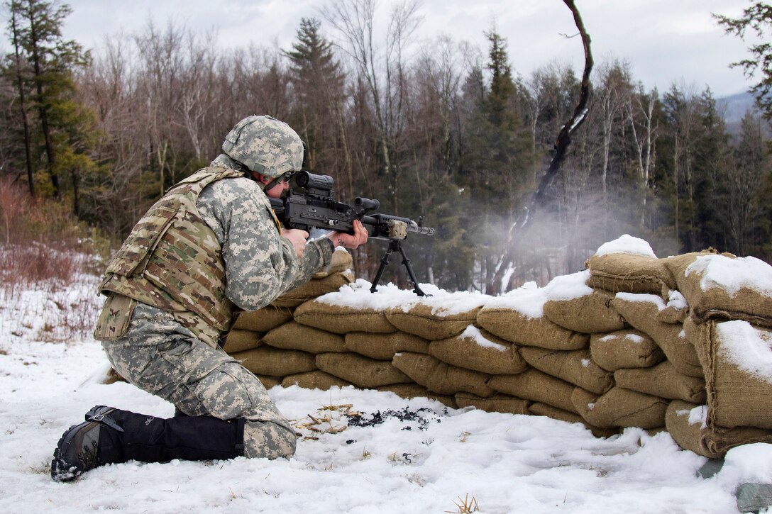 Army National Guard Spc. Anthony Wheeler provides cover fire for mortar crews during a live-fire exercise at Camp Ethan Allen Training Site, Jericho, Vt., Jan. 26, 2017. Wheeler is assigned to the Vermont Army National Guard’s Headquarters Company, 3rd Battalion, 172nd Infantry Regiment, 86th Infantry Brigade Combat Team (Mountain). Army National Guard photo by Spc. Avery Cunningham