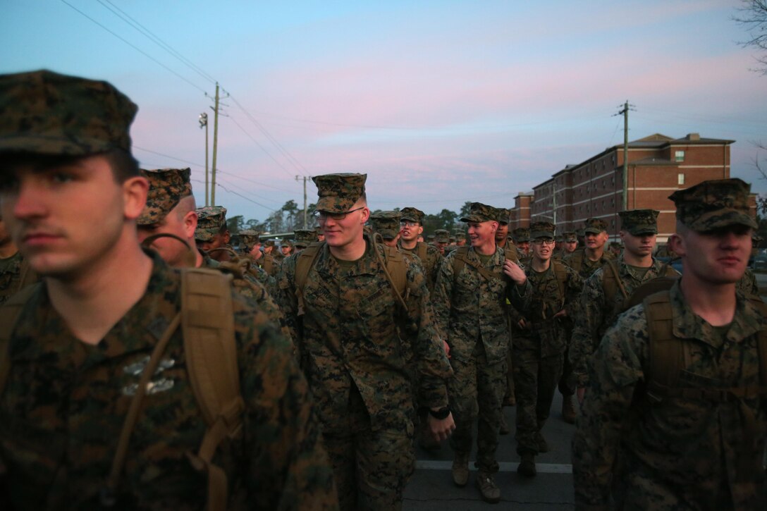 Marines with 2nd Marine Division set out on foot for the 2nd MarDiv 50 mile hike at Camp Lejeune, N.C., Feb. 1, 2017. The hike was a challenge open to officers and enlisted personnel and allowed the Marines to bond as a unit as they step together. The hike originated in 1908 with an executive order administered by then president Theodore Roosevelt and has since then only been attempted and completed twice since its inception.