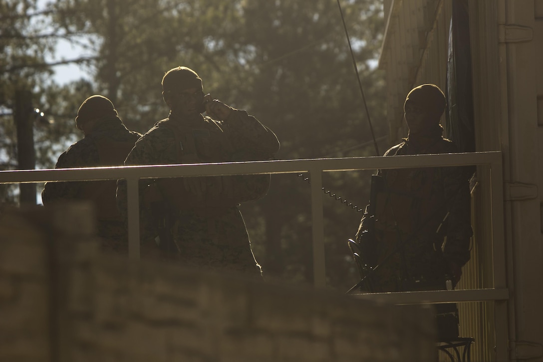 Marines relay communications to the command operation center during an embassy reinforcement exercise at Camp Lejeune, N.C., Jan. 25, 2017. The exercise is part of a preparation for deployment for a Special Purpose Marine Air-Ground Task Force. The Marines are with Alpha Co., 2nd Radio Battalion. (U.S. Marine Corps photo by Lance Cpl. Juan A. Soto-Delgado)