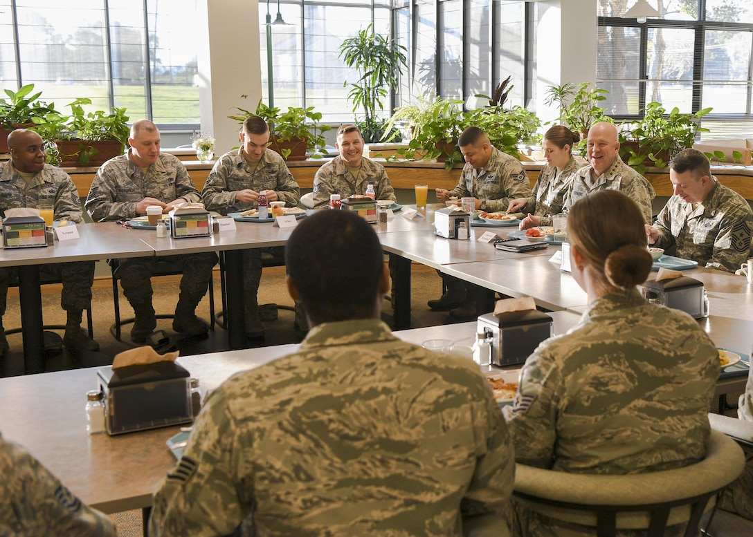 Gen. John “Jay” Raymond, commander, Air Force Space Command and Chief Master Sgt. Brendan Criswell, AFSPC Command Chief, share breakfast with enlisted Airmen from 14th Air Force (Air Forces Strategic) during a visit Jan. 26, at Vandenberg Air Force Base, California.  14th AF is responsible for the organization, training, equipping, command and control, and employment of Air Force space forces to support operational plans and missions for U.S. Combatant Commanders and Air Component Commanders. (U.S. Air Force photo by Capt. Nicholas Mercurio/Released)