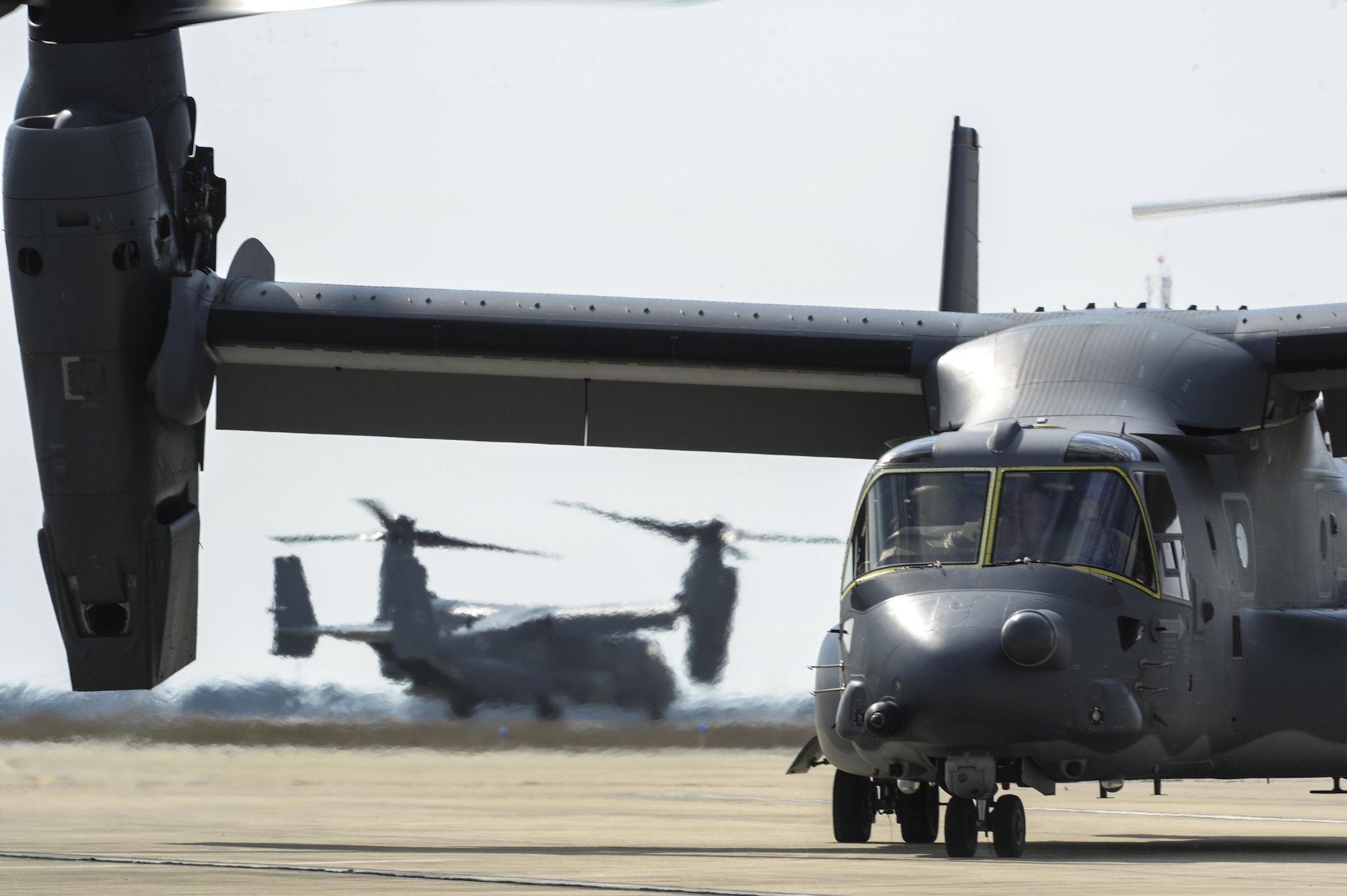 CV-22's Osprey tilt-rotor aircraft assigned to the 8th Special Operations Squadron, with Hurlburt Field, and 20th SOS, with Cannon Air Force Base, N.M., fly in formation over Hurlburt Field, Fla., Feb. 3, 2017. This training mission was the first time in Air Force history that ten CV-22's flew in formation simultaneously. (U.S. Air Force photo by Airman Dennis Spain)