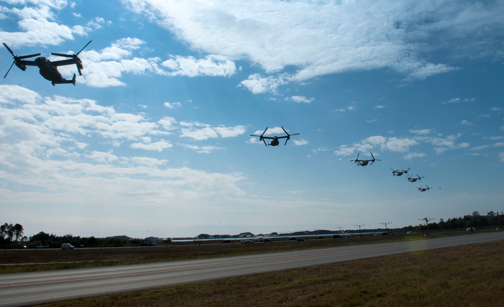 CV-22 Osprey tilt-rotor aircraft assigned to the 8th Special Operations Squadron, with Hurlburt Field, and 20th SOS, with Cannon Air Force Base, N.M., fly in formation over Hurlburt Field, Fla., Jan. 3, 2017. This training mission was the first time in Air Force history that 10 CV-22s flew in formation simultaneously. (U.S. Air Force photo by Senior Airman Krystal M. Garrett)