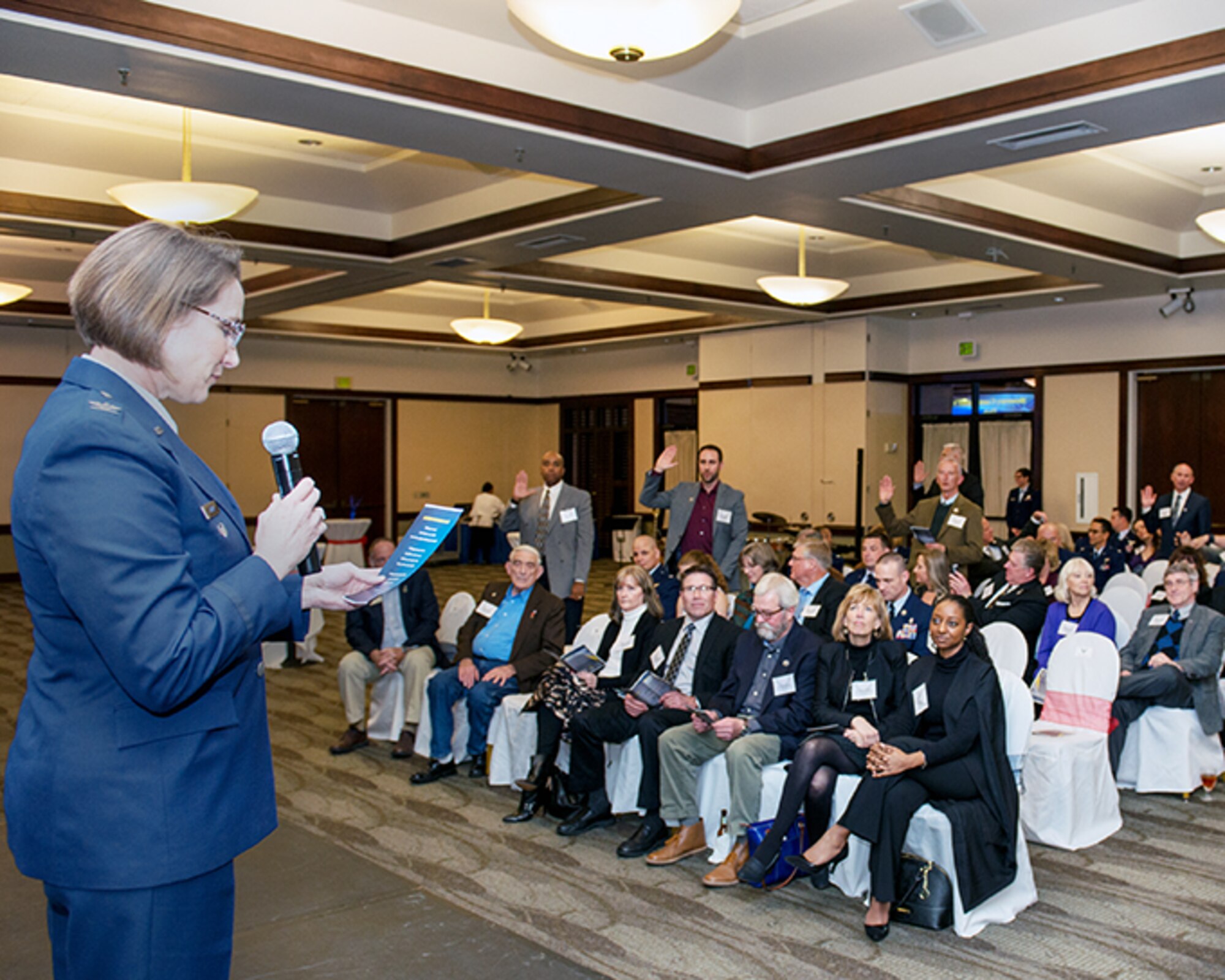U.S Air Force Col. Ruth Meyer administers the honorary commander’s oath to new incoming commanders during a ceremony at Travis Air Force Base, Calif., Feb. 2, 2017. The honorary commander’s program was developed to encourage and exchange ideas, experiences, and friendships between key members of the civilian community and the Travis AFB military community. (U.S. Air Force photo/Louis Briscese)