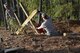 Team Shaw members work together to take apart a defensive fighting position during a beautification project at Shaw Air Force Base, S.C., Feb. 1, 2017. The DFP was used in exercises for personnel deploying downrange, giving them the training to take cover in a shelter and the ability to shoot the enemy. (U.S. Air Force photo by Airman 1st Class BrieAnna Stillman)