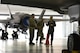 U.S. Air Force Lt. Col. Scott Gunn, 33rd Operations Support Squadron commander, right, discusses the weapons bay of an F-35A Lightning II with COL Samuel Saine, 4th Battlefield Coordination Detachment commander, left, and Sgt. Maj. Miguel Quiros, 4 BCD sergeant major, center, Jan. 26, 2017, at Eglin Air Force Base, Florida. Saine and Qurios visited the 33rd Fighter Wing while conducting a battlefield circulation analysis to engage with and evaluate Ground Liaison Officers embedded in the unit. (U.S. Air Force photo by Staff Sgt. Peter Thompson)